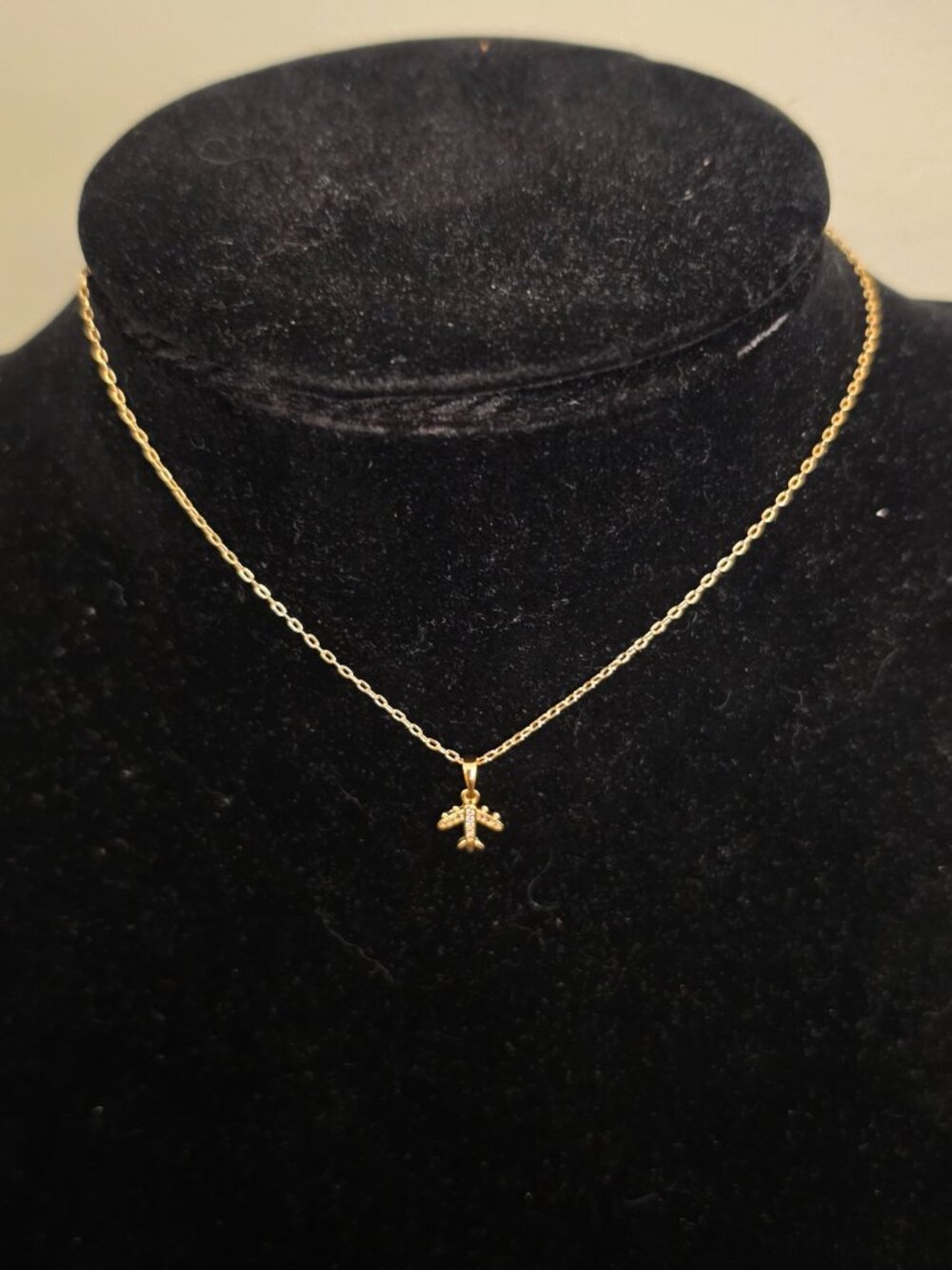 The Jett Necklace is a stylish and unique piece of jewelry featuring a gold plat